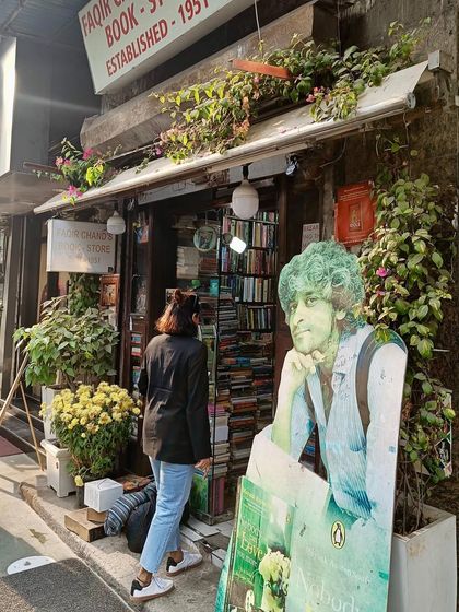 Another shot from my bookstore visit, showing me about to enter the iconic Faqir Chand & Sons.
