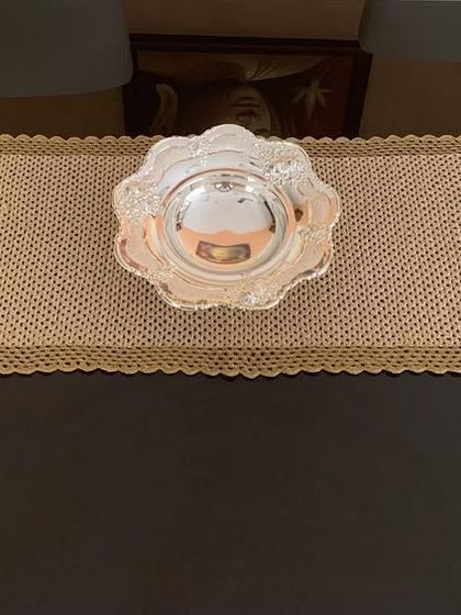 Another view of the classic gold runner, a timeless piece for any home.