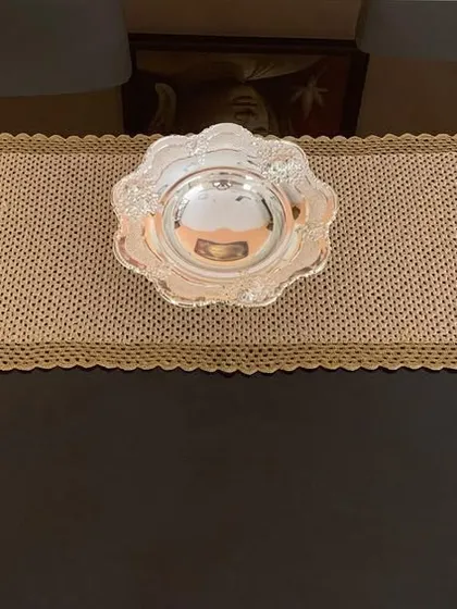 Another view of the classic gold runner, a timeless piece for any home.