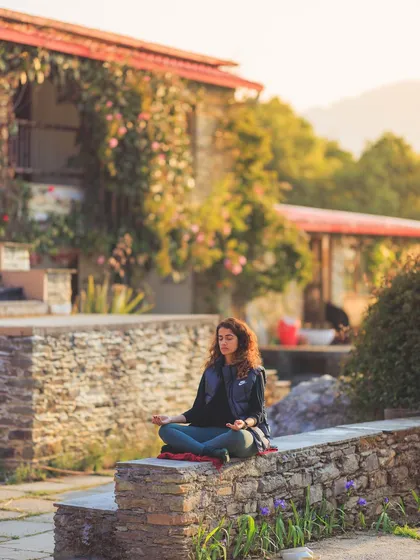 Finding a moment of quiet contemplation at our retreat venue in the Kumaon hills. These pauses are where the real magic happens. It's in the stillness between the breaths that we hear our own inner wisdom.