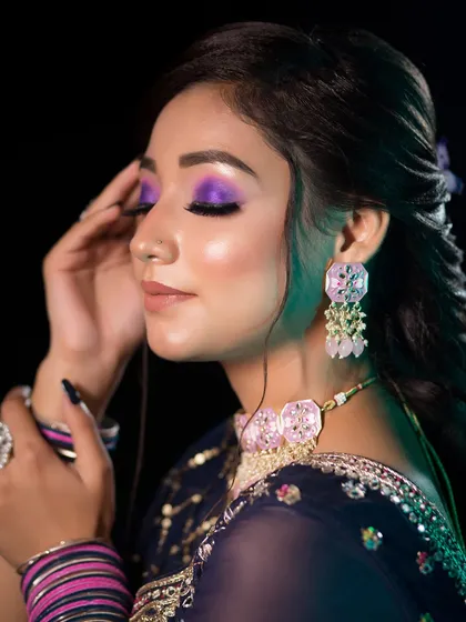 You will also learn to play with color and create bold, glamorous looks like this. This vibrant purple eye makeup is perfect for a reception or sangeet, and I cover these advanced techniques in my diploma course.