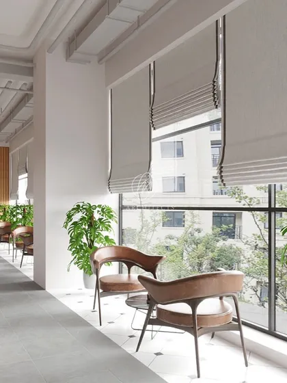 This rendering visualizes a quiet seating nook by the window. The design uses comfortable leather chairs and soft lighting to create a perfect spot for a private conversation or a moment of reflection.