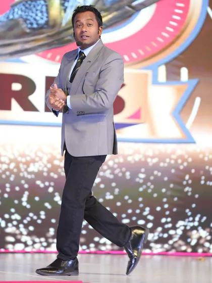 In my element on the MetroBrands stage. A corporate show is all about stage presence, confidence, and connecting with the audience from the moment I walk out.