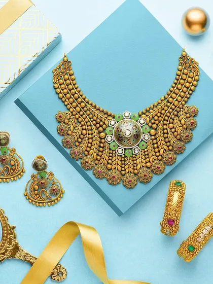 This campaign for PNGadgil and Sons was all about vibrant, complementary colors. We created a full story around this traditional gold jewelry set, using props like the mirror and ribbon to build a scene that feels both classic and fresh. A great product shot is a balance of the product itself and the world it lives in.