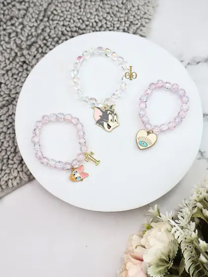 Another angle of our cute and sparkly charm bracelet Rakhis, perfect for younger siblings or those who love a bit of fun.