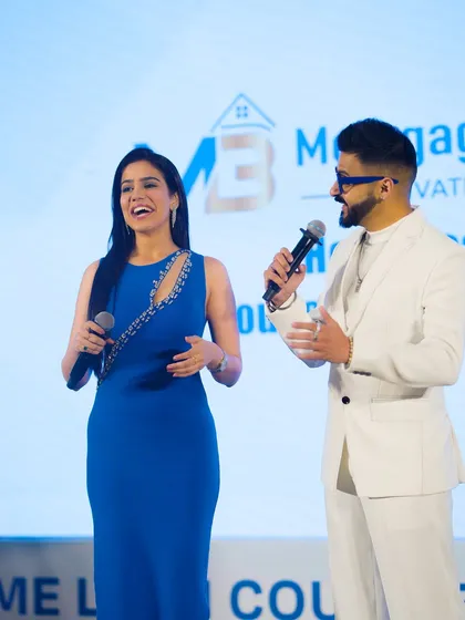 Sharing a laugh with my co-host on stage. Even in a corporate setting, a little humour goes a long way in keeping the energy up.