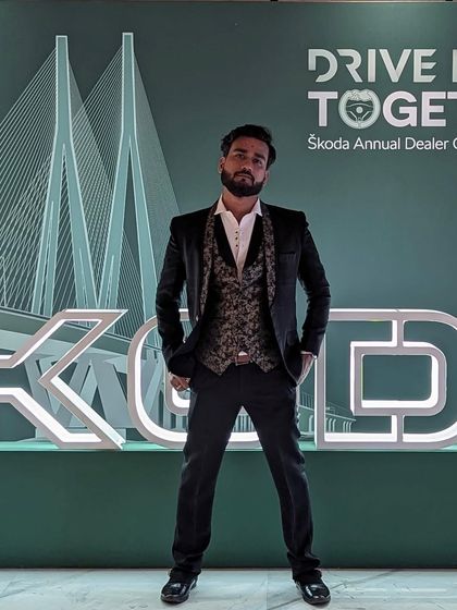 The stage is set for the Skoda Annual Dealer Conference. I am ready to perform and bring their brand story to life through my art.