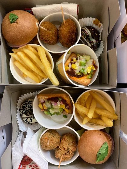 A top-down view of my party snack boxes, showing the variety of treats I can pack for your event. Each box is a mini feast for kids and adults alike.