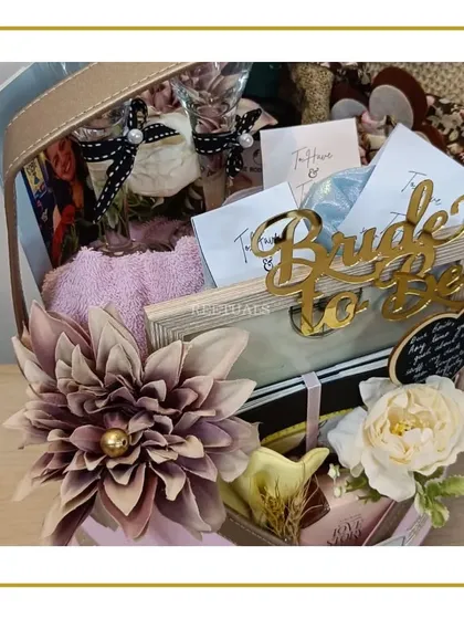 Another view of the 'Bride-to-be' hamper, highlighting the "Bride to be" acrylic tag and the mix of pampering and celebratory items.