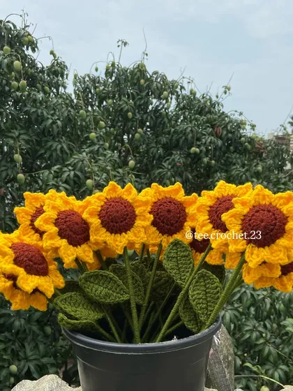 The sunflower bouquet arranged in a pot, a perfect piece of home decor.