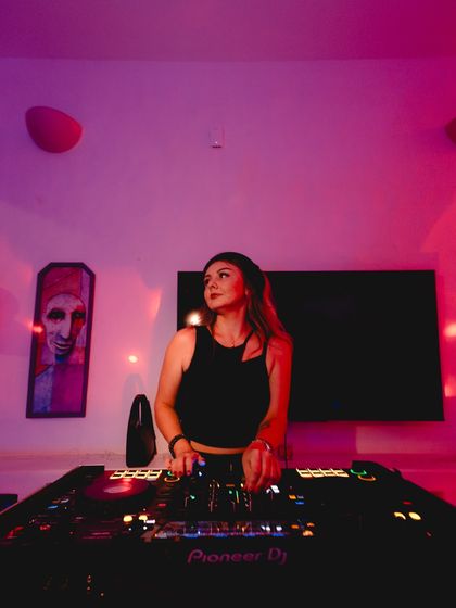 A more casual setting for a private party, but the focus on the music is the same. The art in the background adds a unique vibe.