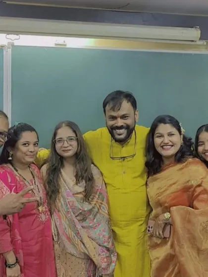 The male and female faculty members of Divesh Classes celebrating the festival of lights together.