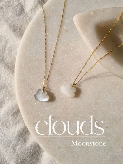 My moonstone cloud pendants, available in different shades. Each one is a unique birthstone that can help with luck and manifestation.