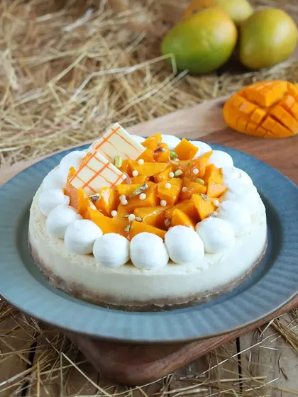 Our baked fresh mango cheesecake is a seasonal best-seller, combining a creamy cheesecake base with a sweet and tangy mango topping.
