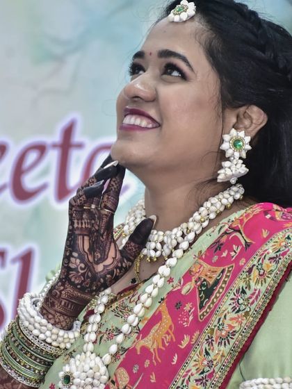 The beautiful mom-to-be, glowing and happy with her special baby shower mehendi.