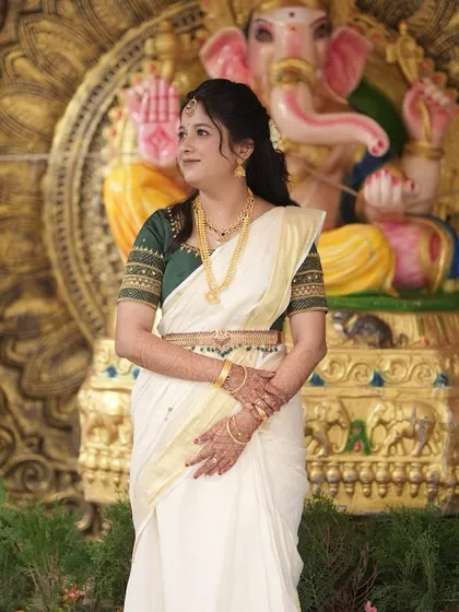 Here is another angle of this serene Muhurtham look. The makeup was designed to be long-lasting and photograph beautifully, even in the bright temple lighting, ensuring the bride looked her best.