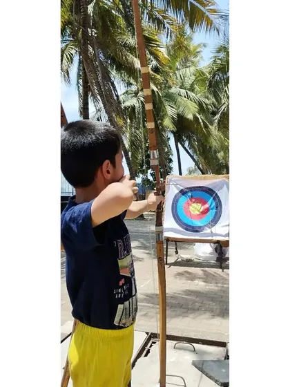 A young student from our May batch, learning the basics of aiming and shooting.