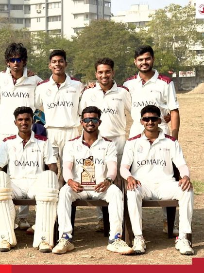 Part of the victorious university cricket team sits for a photo after a dominant 8-wicket win during the AIU West Zone tournament.