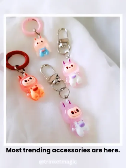 The most trending accessories are here. A flat lay of my adorable Labubu keychains, showcasing their cute designs and pastel colors.