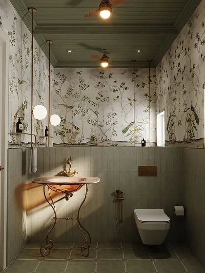 This powder room is a dramatic and enchanting space, featuring a soft green wainscoting topped with a beautiful floral and bird-themed wallpaper. The vintage-style basin and hanging globe lights add to its classical charm.