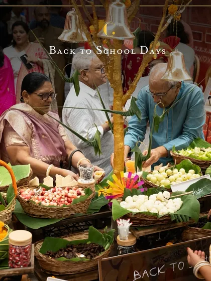 Guests of all ages delight in our 'Back to School' counter. This candid moment shows the joy and nostalgia that our interactive and thematic food stations can bring to an event.