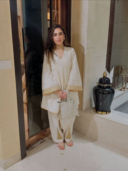 A full view of my Rakhi outfit. The V-neck and flared sleeves give this traditional silhouette a modern feel.