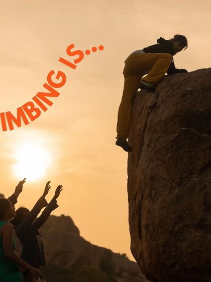Climbing is more than just climbing. It's about overcoming fear, building friendships, and connecting with yourself. This photo captures a climber topping out a boulder as the sun sets.
