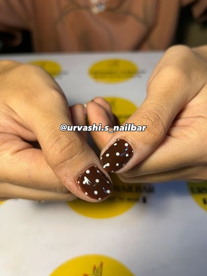 The perfect "Latte Girl" aesthetic. This cozy set features hand-painted bows, polka dots, and plaid patterns in shades of chocolate brown and cream for a look that's timelessly chic.