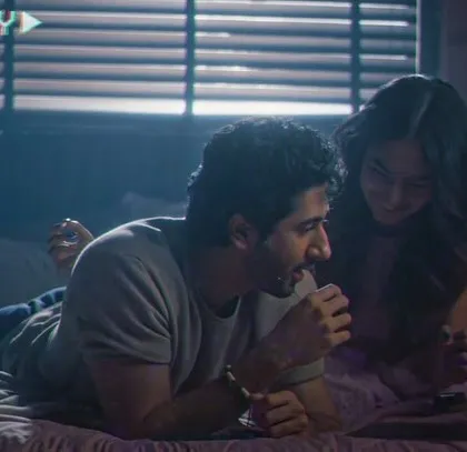 A cozy, intimate scene from the film. The styling here is all about comfort and realism, helping to create a believable and heartwarming story for the brand.