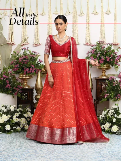 "All in the Details" - this graphic highlights the intricate craftsmanship of our orange and red bridal lehenga.