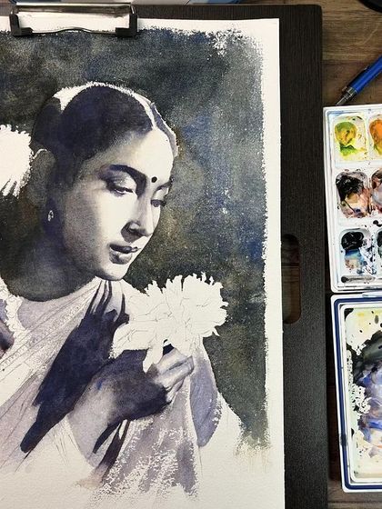 A work-in-progress shot of the Nutan portrait, with the face and background wash complete. The flowers and clothing are still to be painted.