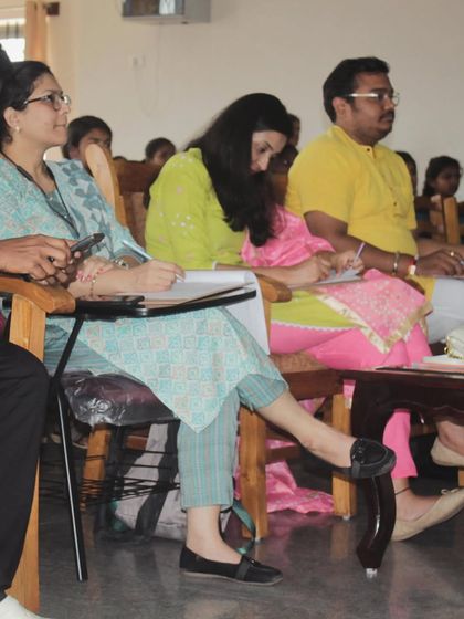 Focused on the details while judging at the Nakshatra talent event.