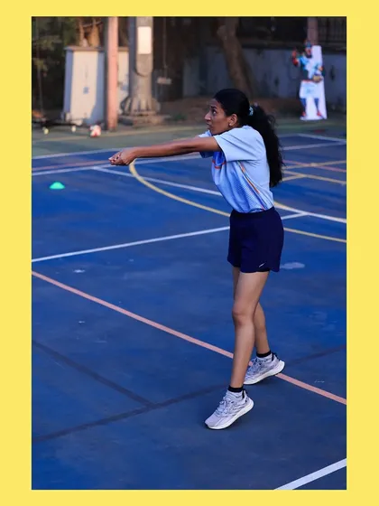 With eyes locked on the ball, this player demonstrates excellent form and readiness during a passing drill. Her focus is a model for all our athletes.