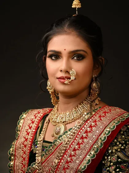 A detailed portrait shot focusing on the flawless base and eye makeup. We practice HD makeup techniques extensively to achieve this level of perfection.