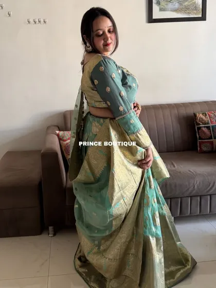 A side view of the Banarasi lehenga, showing the beautiful flare of the silk skirt and the matching embroidered blouse.