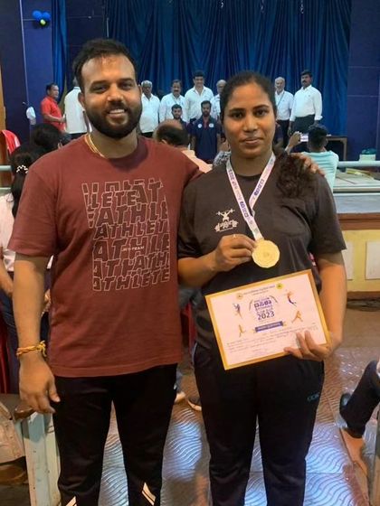 Celebrating with one of our gold medal winners at the Dasara CM Cup 2023. Our women's team won the team championship, a huge achievement for everyone involved.