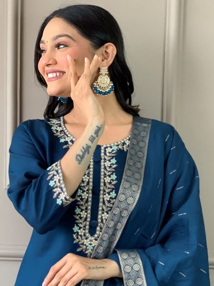 This blue viscose chanderi kurta has such a classy vibe. The heavy thread embroidery on the neckline and cuffs adds a touch of elegance to a simple silhouette.