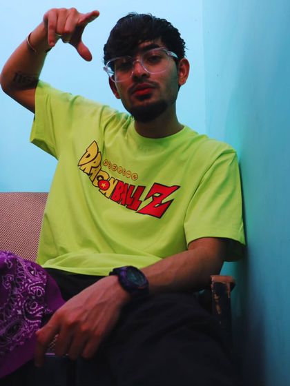 A behind-the-scenes shot from the 'Real Thug' music video shoot. The energy on set is just as important as the energy in the studio. I'm involved in the whole process to ensure the vibe stays authentic.