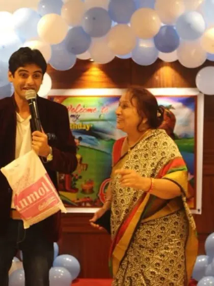 Handing out prizes during a game session at a birthday party. A little friendly competition and rewards are a great way to keep the energy high and the guests engaged.
