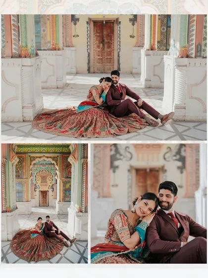 Navi and Diljot seated on the floor of a colorful room at Patrika Gate, but the traditional attire and regal poses give it a palace-like feel.