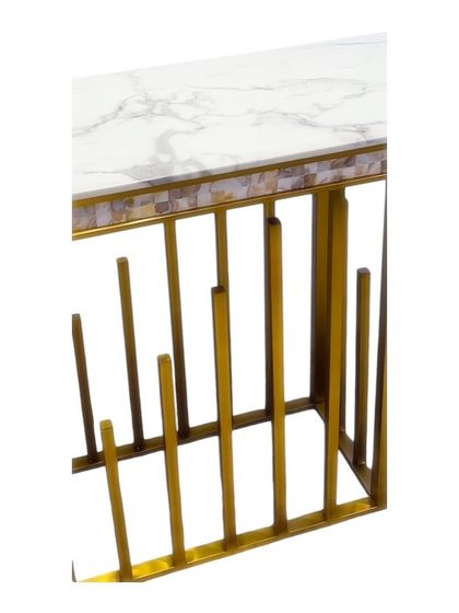 A detailed view of the Golden Spectra Console Table, highlighting the beautiful mother-of-pearl detailing along the edge of the marble top. This is the kind of meticulous craftsmanship we put into every piece.
