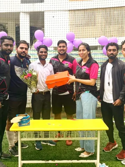 Our coaching staff presenting a birthday gift. We believe in creating strong, personal bonds with everyone in our academy, making it a supportive and caring environment.