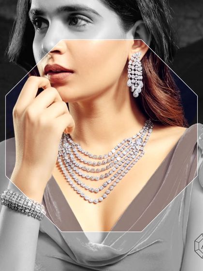 A fresh take on timeless bridal beauty. This multi-layered diamond necklace, crafted with baguette and round diamonds in 18k gold, adds depth and dazzle to your look.