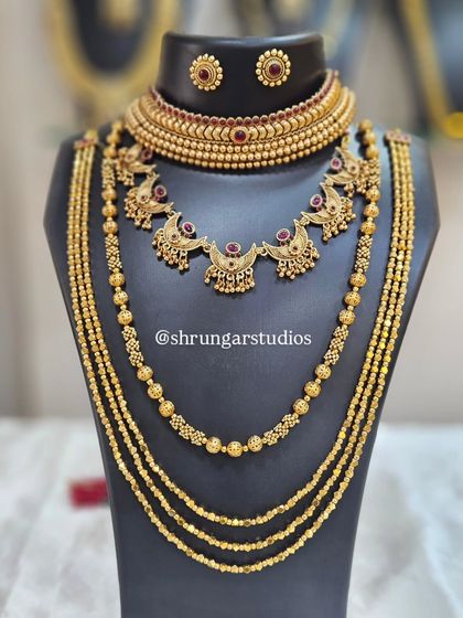 Unique caption for media id 51 describing the specific jewellery and look.