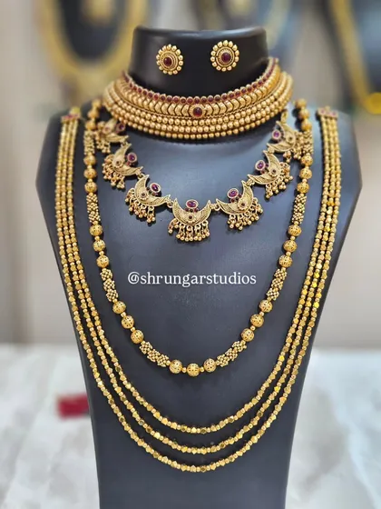 Unique caption for media id 51 describing the specific jewellery and look.