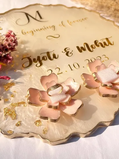 Another shot of the rose ring holder platter, showing the rings placed for the ceremony.