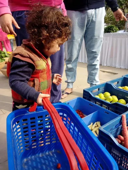 This market is for everyone, especially the little ones. We love seeing children get curious about vegetables, picking their own food, and learning where it comes from. It's a family affair, every single weekend.