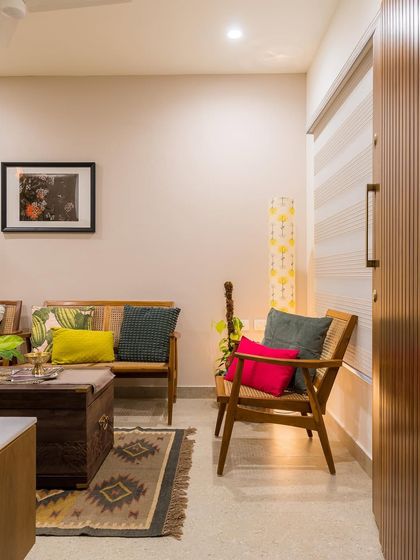 A view from the entrance of the living room, showing how the arrangement of furniture creates a welcoming and intimate seating area.