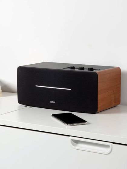 The Edifier D12 is a fantastic all-in-one stereo speaker for your desktop or a small room. Its classic wood finish and simple controls provide a great-sounding, stylish audio solution for music, gaming, or watching videos.