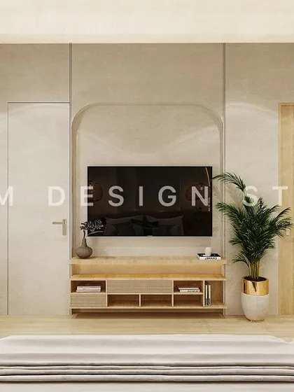 The TV wall in the Scandinavian-inspired bedroom features an arched niche and a floating console, maintaining a light and airy feel. A hidden door is seamlessly integrated into the design.